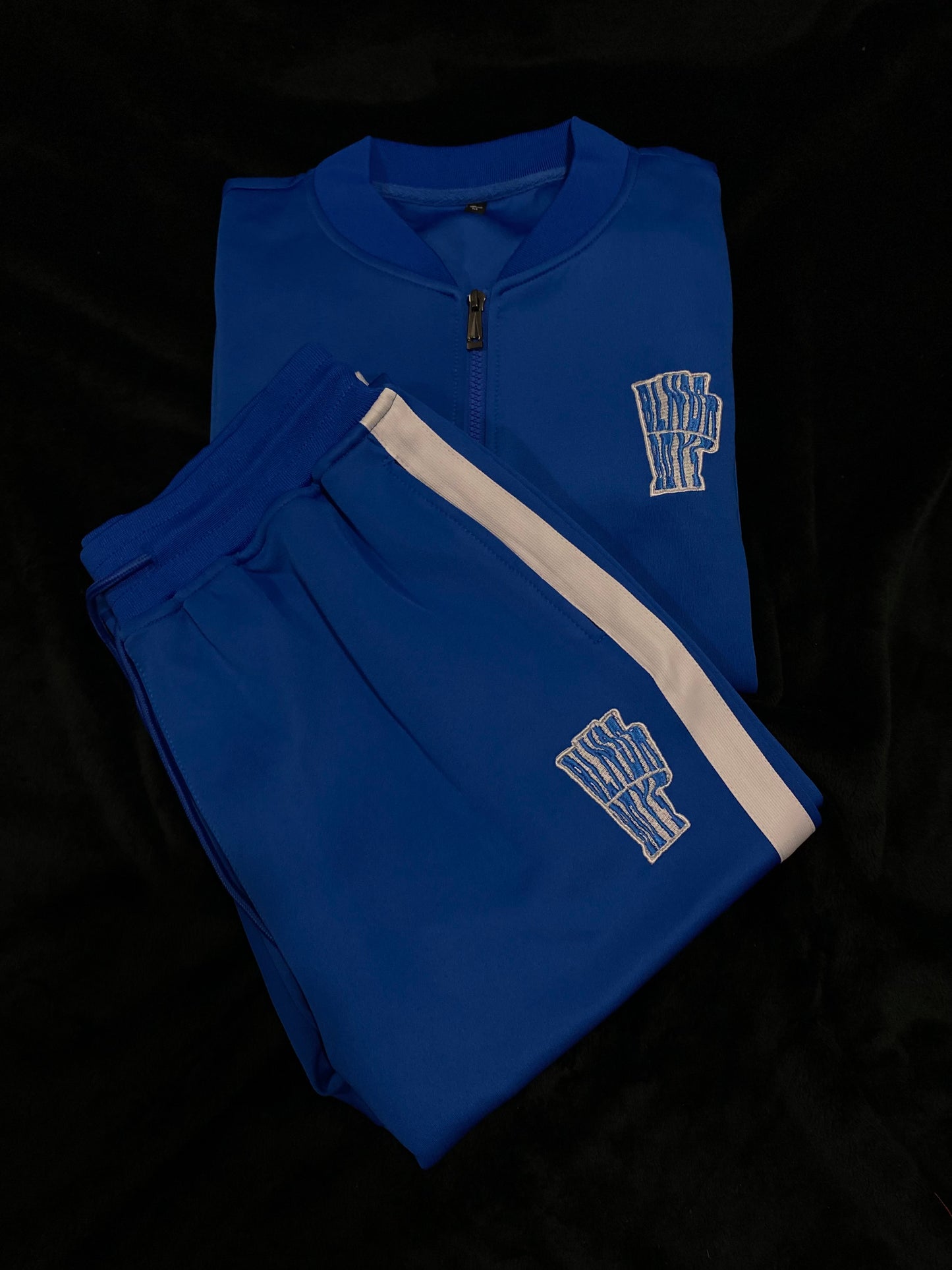 “Trappin ain’t dead” tracksuits